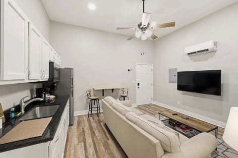 Unit 3 Living Area: Relax in this cozy living space with kitchenette, perfect for unwinding after exploring Churchill Downs and Louisville’s top eateries nearby.