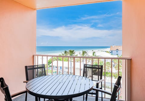 Your private fifth-floor balcony pairs comfortable outdoor seating with beautiful Gulf and beach views.