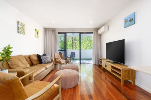 Comfortable lounge setting with cosy seating and a warm atmosphere for gatherings or quiet nights in.