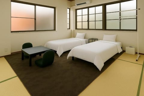 Deluxe Twin Room | Blackout drapes, WiFi (free), bed sheets