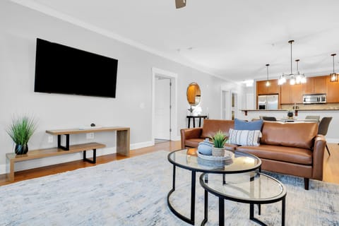 Bright, open-concept living area featuring modern design, warm finishes, and plenty of space to unwind.