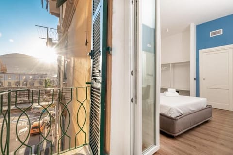 Deluxe Double Room, Balcony, City View | Blackout drapes, soundproofing, iron/ironing board, free WiFi