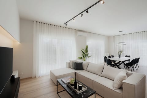 Luxury Apartment, 4 Bedrooms, Non Smoking, City View | Living area | 42-inch TV with cable channels