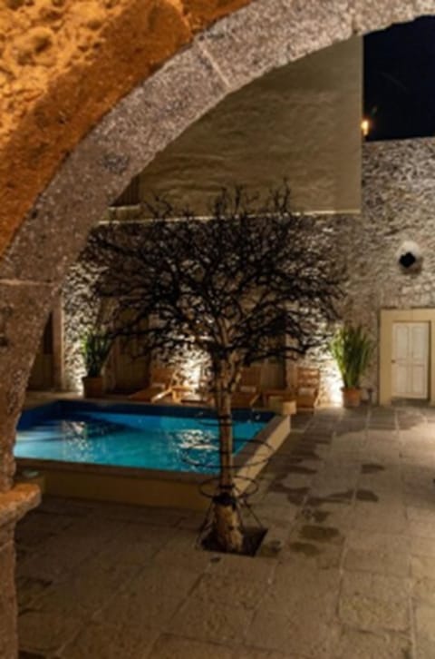 Outdoor pool, open 10:00 AM to 8:00 PM, free cabanas, pool umbrellas