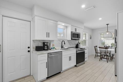 fully stocked galley kitchen in front facing unit
