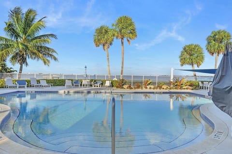 Resort-style waterfront pool overlooking the Indian River.