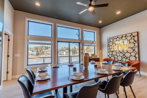 Our dining area & kitchen island will seat up to 16 guests.