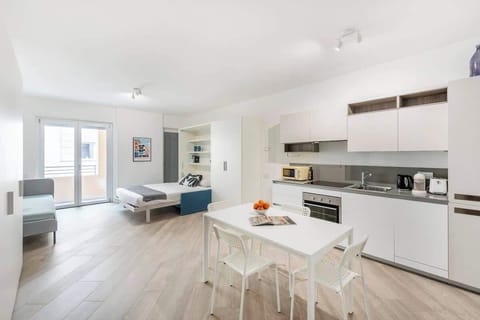Practical and full equipped studio with a queen size bed, a single bed and full kitchen will high quality appliances in a wonderful modern building unique in the center of Rome.