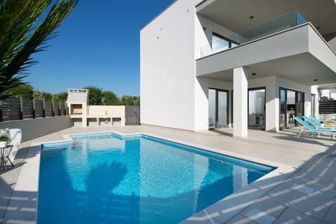 Private swimming pool and grill