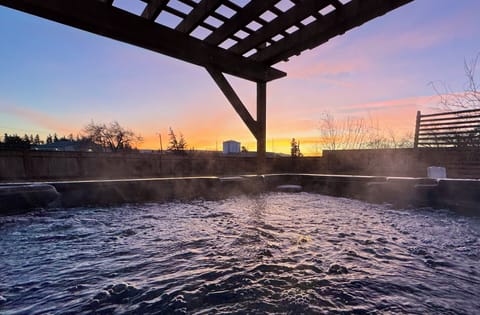 Relax in our backyard hot tub - a perfect way to end your day 