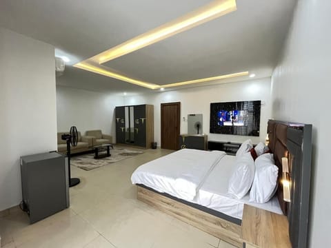 Family Room, Balcony, City View | Desk, laptop workspace, blackout drapes, soundproofing