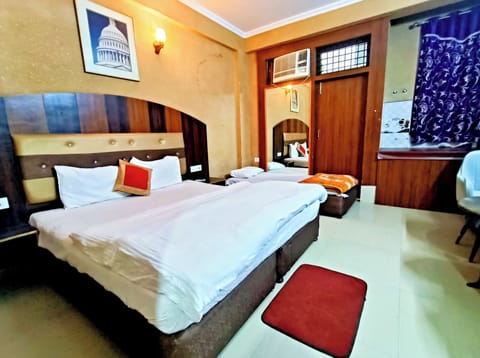 Premium bedding, desk, laptop workspace, soundproofing