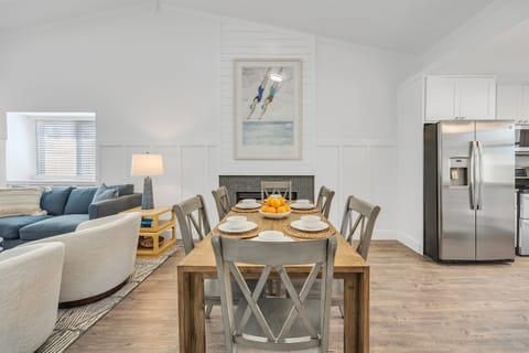 An open dining space that flows seamlessly into the kitchen and living room 