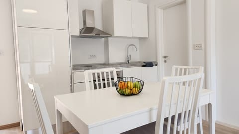 dining table, oven, stovetop