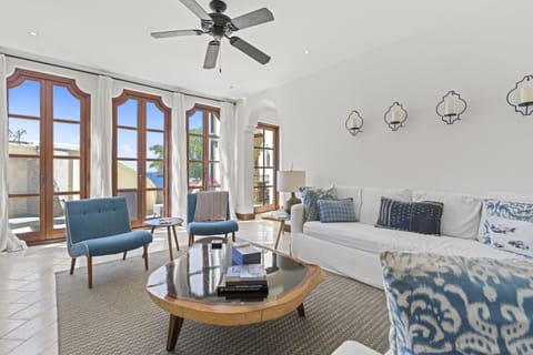 Living area inside, with Smart TV, DVD's, board games, AC, access to one full bathroom, and one half bath
