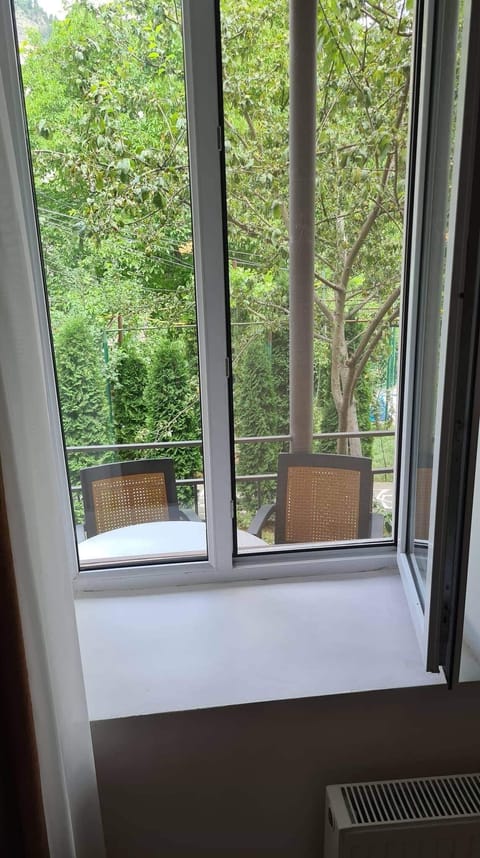 Room, Balcony, Garden View | Iron/ironing board, free cribs/infant beds, free rollaway beds