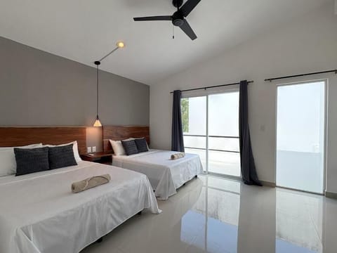 Basic Double Room, 2 Queen Beds | Desk, laptop workspace, WiFi (free)