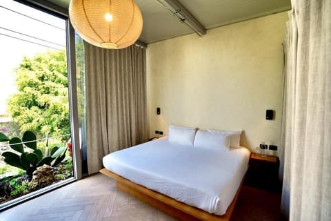 Double Room, City View | In-room safe, iron/ironing board, free WiFi