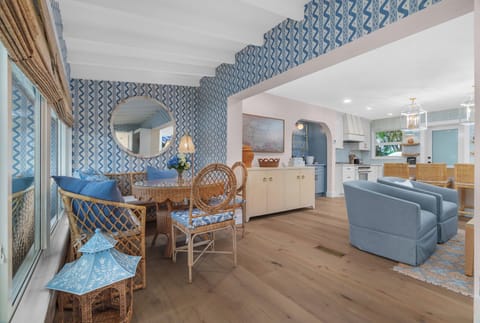 This light-filled dining nook blends natural textures and eye-catching design, offering a cozy place to share food and conversation.