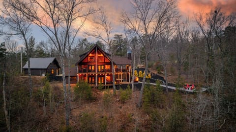 Soak, steam, or relax on the covered deck under a magical mountain sunset