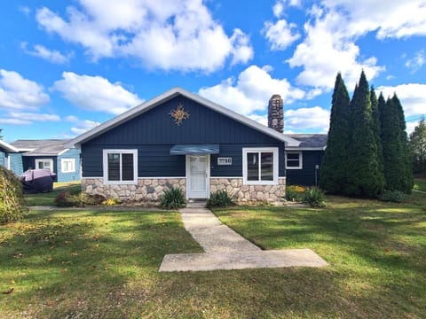Charming Exterior | Blue Siding & Inviting Entry