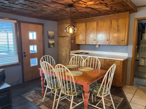 Dining Area | Warm Wood Ceiling & Cozy Seating