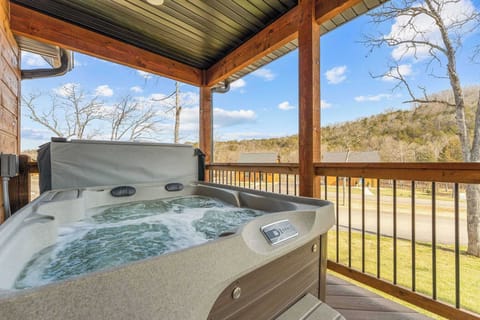 Soak in the Ozarks in your own private hot tub on the back deck!