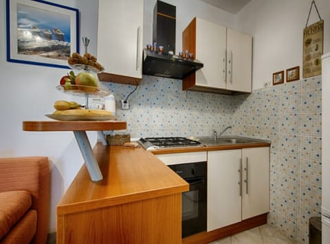 Apartment (A1 - TwoBedroom Apartment with Terrac) | Private kitchen | Fridge