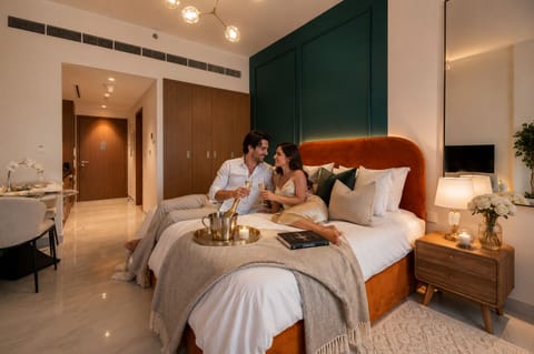 Deluxe Studio | Premium bedding, memory foam beds, in-room safe, blackout drapes