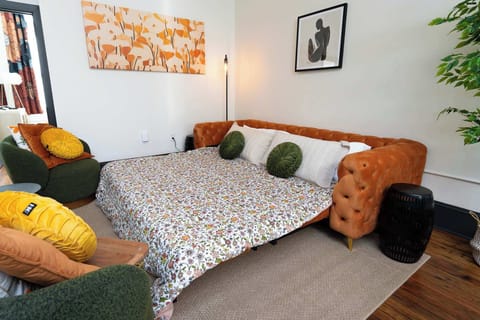 Sofa pulls out into a surprisingly comfortable KING size bed! You must include the extra guests in your reservation so we can ensure extra bedding and towels are left for you.