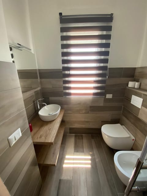 Shower, towels, soap, toilet paper