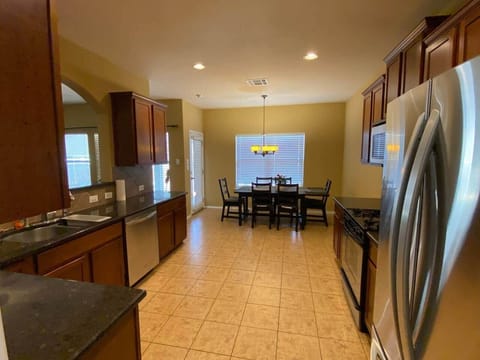 Full Eat-in Kitchen 
Stocked with most basic utensils 
Kitchen Table and Chairs for 6
New LG Refrigerator 
Microwave 
Dishwasher 
Oven, stove