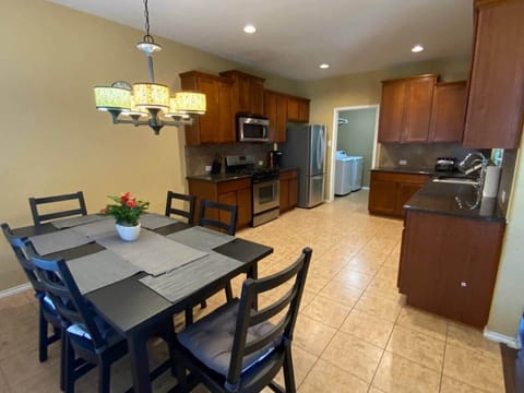 Full Eat-in Kitchen 
Stocked with most basic utensils 
Kitchen Table and Chairs for 6
New LG Refrigerator 
Microwave 
Dishwasher 