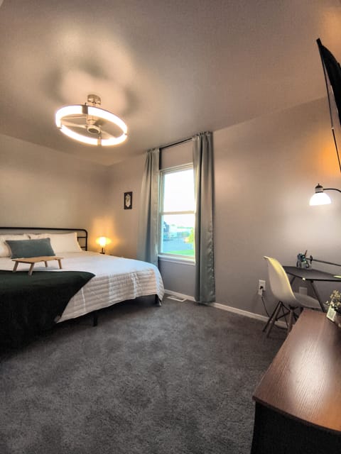 room, indoor, bed, private space, desk, dining table, TV 