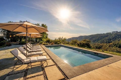 Sun-drenched poolside retreat with stunning mountain views