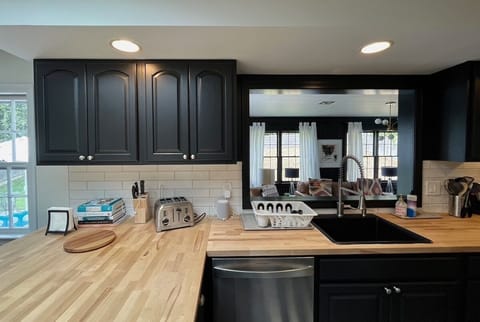 kitchen looks into the media room