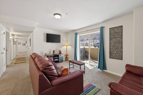 Cozy up in style- this living room is perfect for relaxation and gathering.