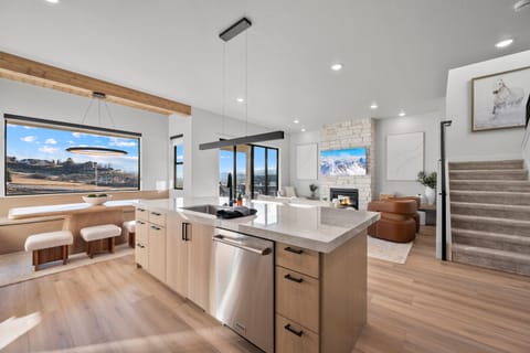 Modern elegance throughout the fully appointed chefs kitchen with huge island