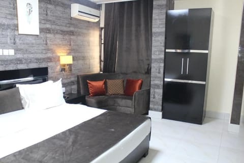 Deluxe Room, Balcony, City View | Desk, laptop workspace, blackout drapes, soundproofing
