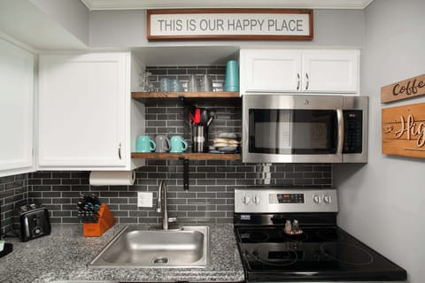 Fully stocked kitchen with modern appliances