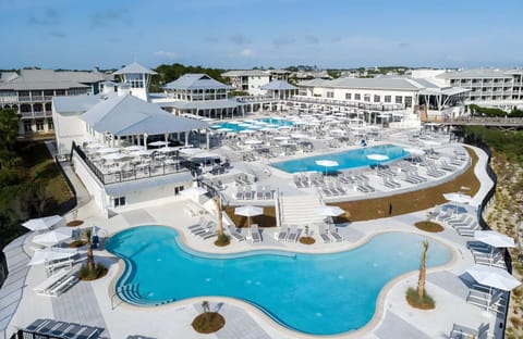 Enjoy a breathtaking aerial view of the emerald Gulf coastline just steps away.