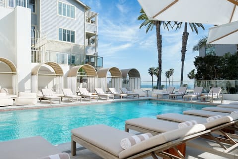 Outdoor pool, open 8:00 AM to 10:00 PM, cabanas (surcharge)