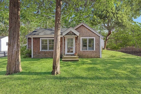 Charming shingle exterior and peaceful, tree-lined yard at Cedar & Salt.