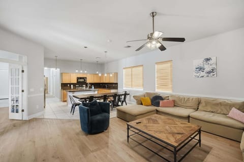 open concept Livingroom, dining room, and kitchen with Roku TV