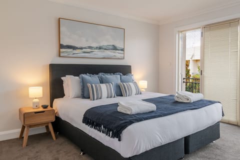 Bedroom 1 - King, Private Balcony, Heating, AC, Desk + Built-in Robe