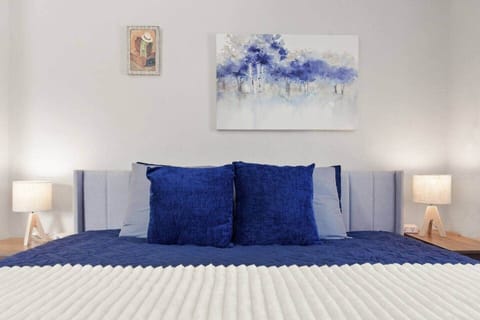 Bedroom 3 features a comfortable king-sized bed, and ample space to relax and unwind. 