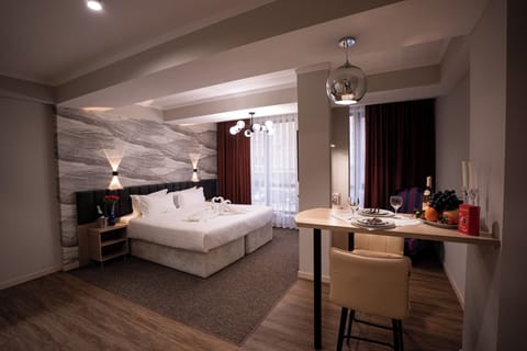 Luxury Suite, City View | In-room safe, soundproofing, iron/ironing board, free WiFi