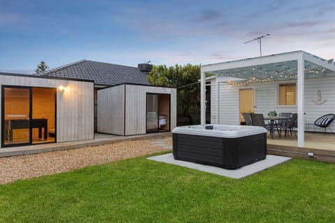 Private yard with spa and greenery