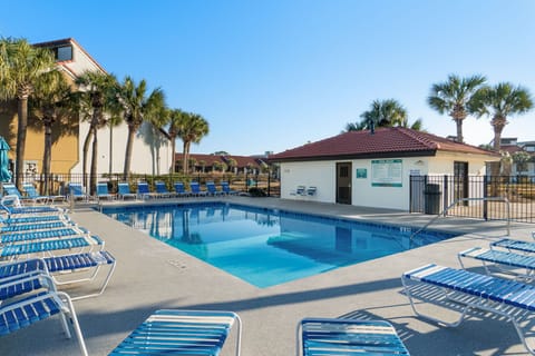 Enjoy poolside views right behind the villa. 