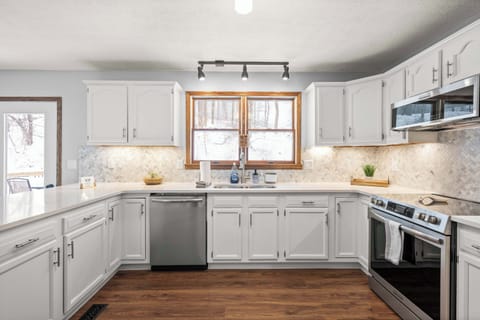 Located upstairs, the open kitchen is well equipped for an unforgettable getaway